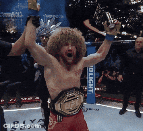 Man In Boxing Ring With Bud Light Sign GIF