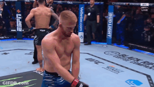 Man In Boxing Ring With Bud Light Sign GIF