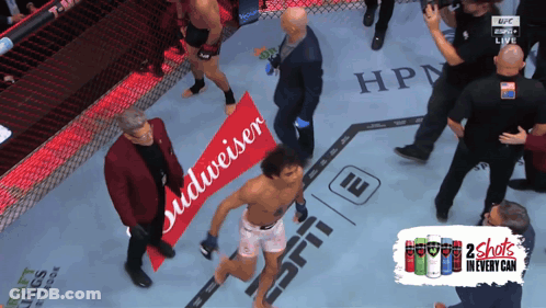Man In Boxing Ring With Budweiser Banner GIF