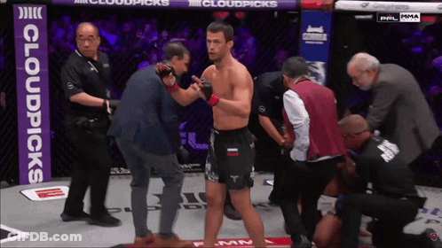 Man In Boxing Ring With Cloudpicks Banner GIF