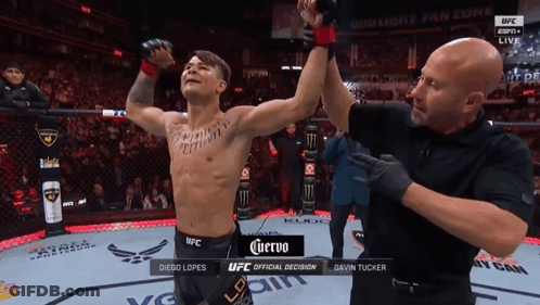 Man In Boxing Ring With Corona GIF