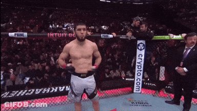 Man In Boxing Ring With Crypto.com Sign GIF