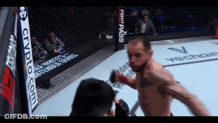 Man In Boxing Ring With Crypto.com Sign GIF