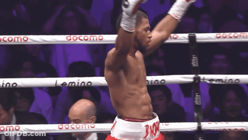 Man In Boxing Ring With Docomo On Ropes GIF