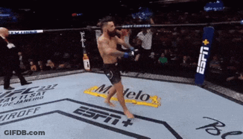 Man In Boxing Ring With ESPN Banner GIF