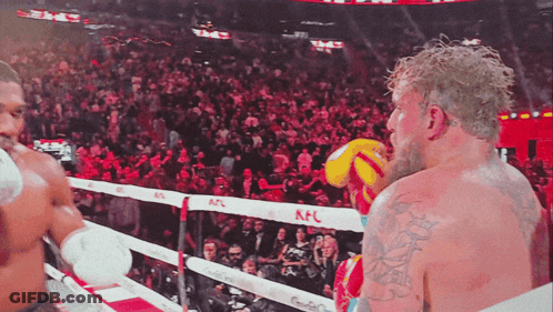 Man In Boxing Ring With KFC Banner GIF