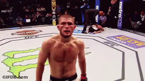 Man In Boxing Ring With Metropcs Banner GIF