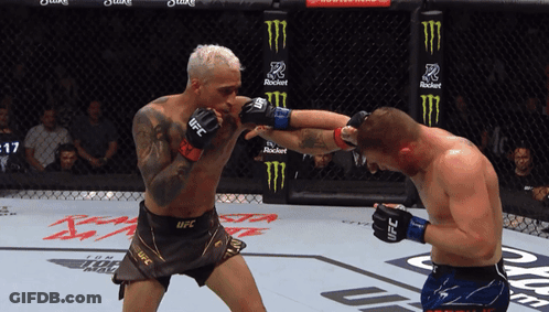 Man In Boxing Ring With Mickey 17 GIF