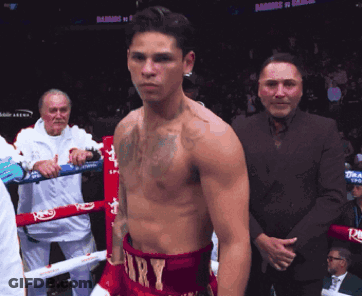 Man In Boxing Ring With Ramos Vs Ramirez Sign GIF