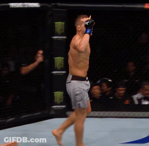 Man In Boxing Ring With Red Air Asia Sign GIF
