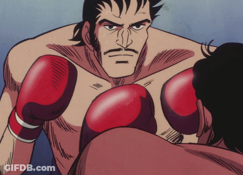 Man In Boxing Ring With Red Gloves GIF