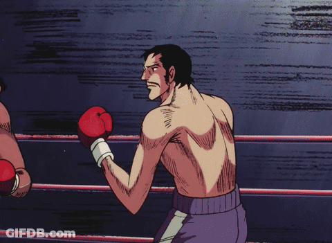 Man In Boxing Ring With Red Gloves GIF