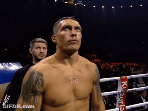 Man In Boxing Ring With Red Kuzurla Ribbon GIF