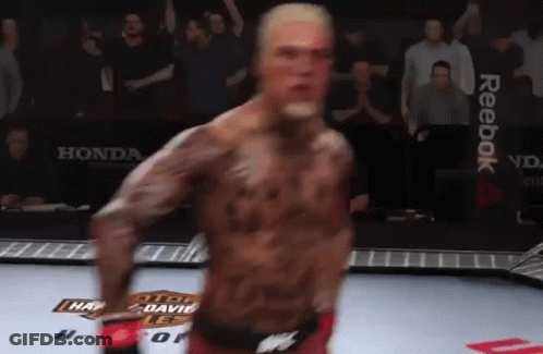 Man In Boxing Ring With Reebok On Wall GIF