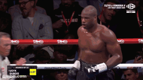 Man In Boxing Ring With Ribbons GIF
