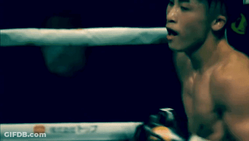 Man In Boxing Ring With T7 Sign GIF