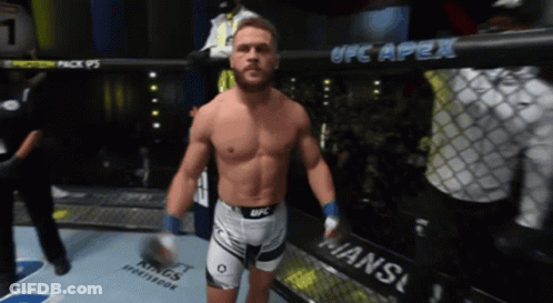 Man In Boxing Ring With UFC Apex Sign GIF
