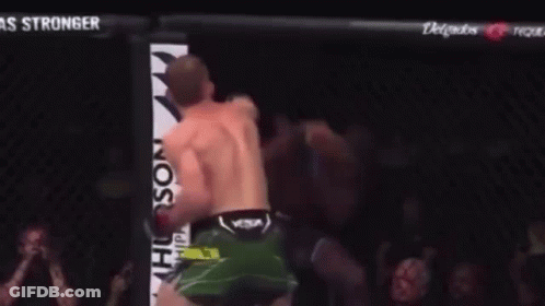 Man In Boxing Ring With UFC Fight Pass Sign GIF