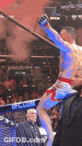 Man In Boxing Ring With UFC Logo GIF