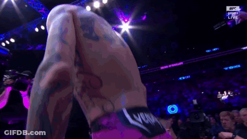 Man In Boxing Ring With UFC Logo GIF
