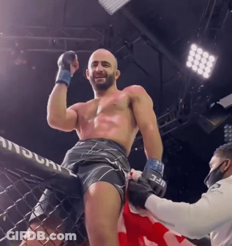 Man In Boxing Ring With UFC Logo Shorts GIF
