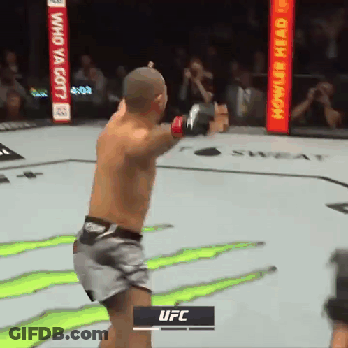 Man In Boxing Ring With UFC Sign GIF