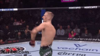 Man In Boxing Ring With Vochain Logo GIF