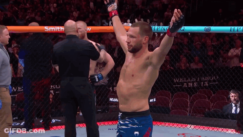 Man In Boxing Ring With Wells Fargo On Back GIF