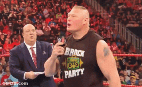 Man In Brick Party Shirt In Wrestling Ring GIF