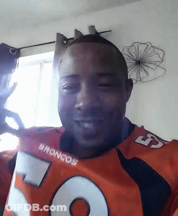 Man In Broncos Jersey Smiling GIF