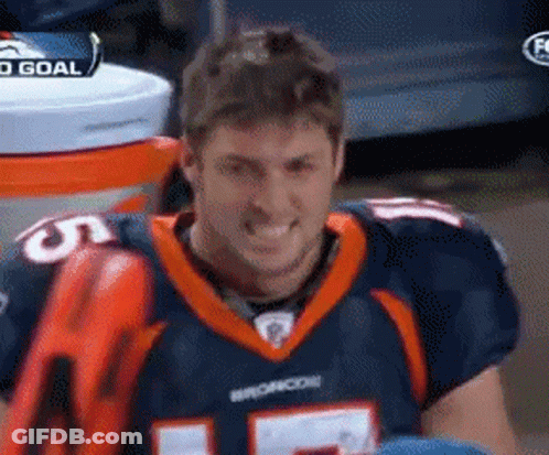 Man In Broncos Jersey Smiling At Camera GIF