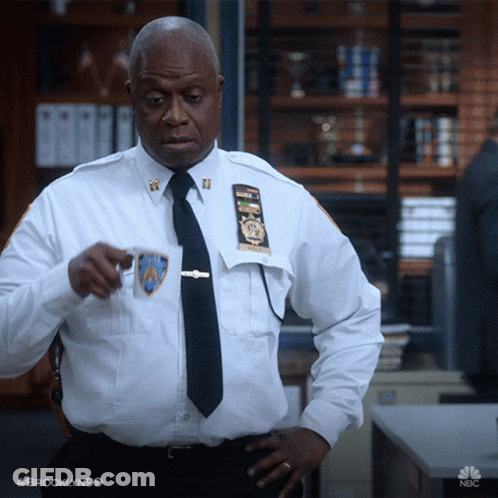Man In Brooklyn 99 Uniform Holding Coffee Cup GIF