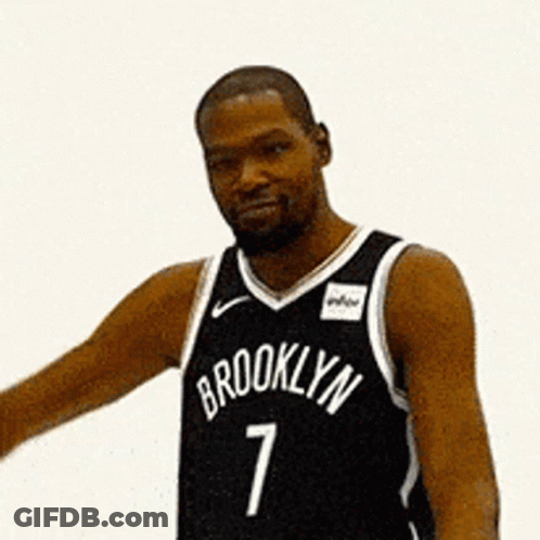 Man In Brooklyn Jersey Flexing Muscles GIF