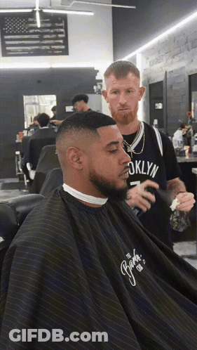 Man In Brooklyn Jersey Getting Barber Haircut GIF