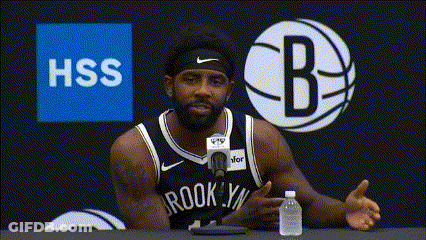 Man In Brooklyn Nets Jersey Talking Into Microphone GIF