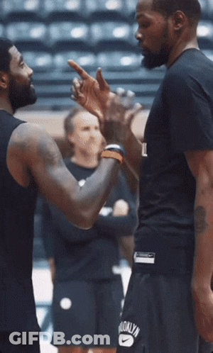 Man In Brooklyn Shirt Talking GIF