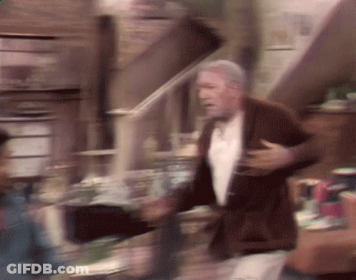 Man In Brown Coat GIF