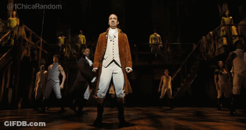 Man In Brown Coat On Stage With Chica Random GIF