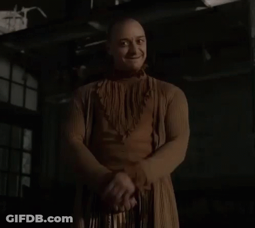 Man In Brown Dress Shaking Hands GIF