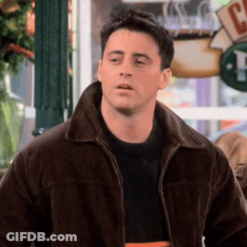 Man In Brown Jacket And Black Sweater GIF