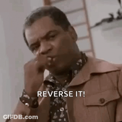 Man In Brown Jacket And Tie Smoking Saying Reverse It GIF