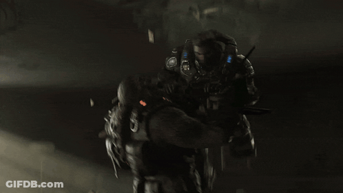 Man In Brown Jacket Holding Another Man's Neck In Dark Room GIF