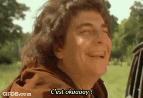 Man In Brown Jacket Laughing Saying C'est Okaaay GIF