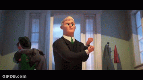 Man In Brown Jacket Next To Woman In Red Dress GIF