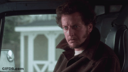 Man In Brown Jacket Sitting In Back Seat Of Car GIF