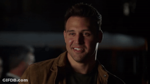 Man In Brown Jacket Smiling GIF