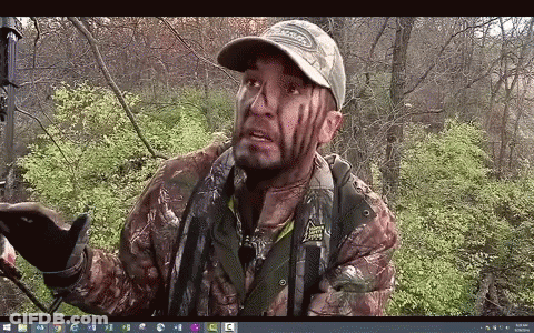 Man In Brown Jacket Smiling Saying Wasup GIF