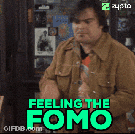 Man In Brown Jacket Standing Before Feeling FOMO Sign GIF