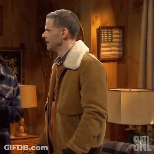 Man In Brown Jacket With American Flag GIF