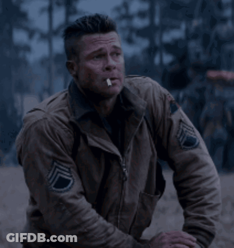 Man In Brown Jacket With Cigarette GIF